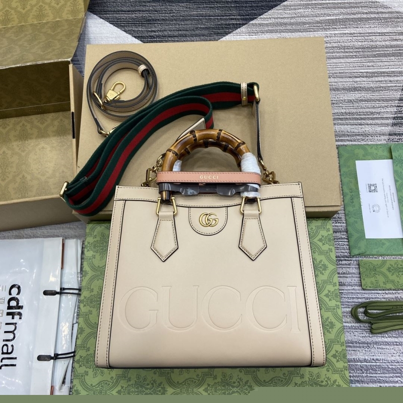 G*u*i top handle bags